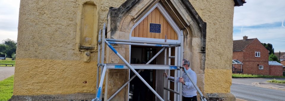 Scaffolding tower in place for more maintenance work to the door frame